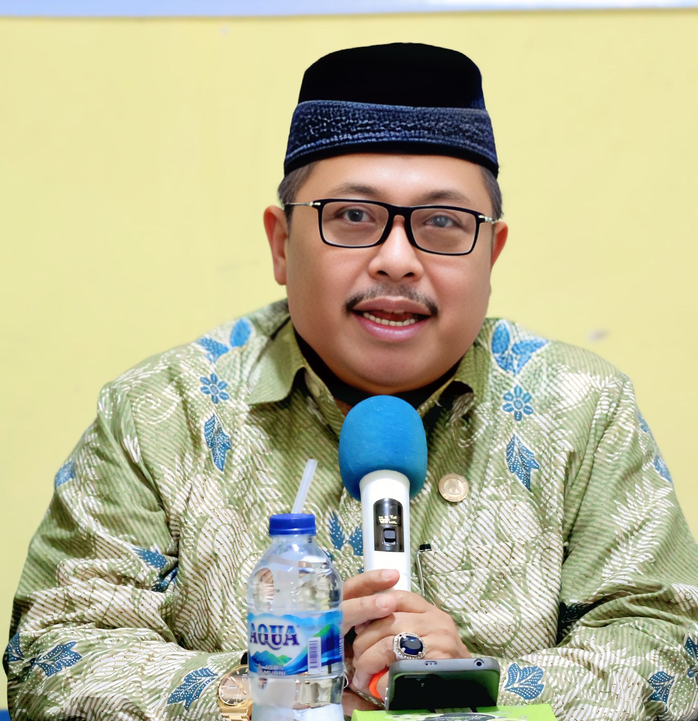 Dr. Amril Amir, M.Pd., Dt. Lelo Basa